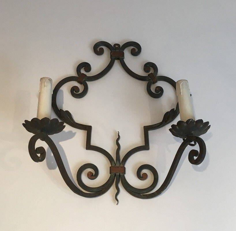 Pair of large decorative wrought iron wall sconces