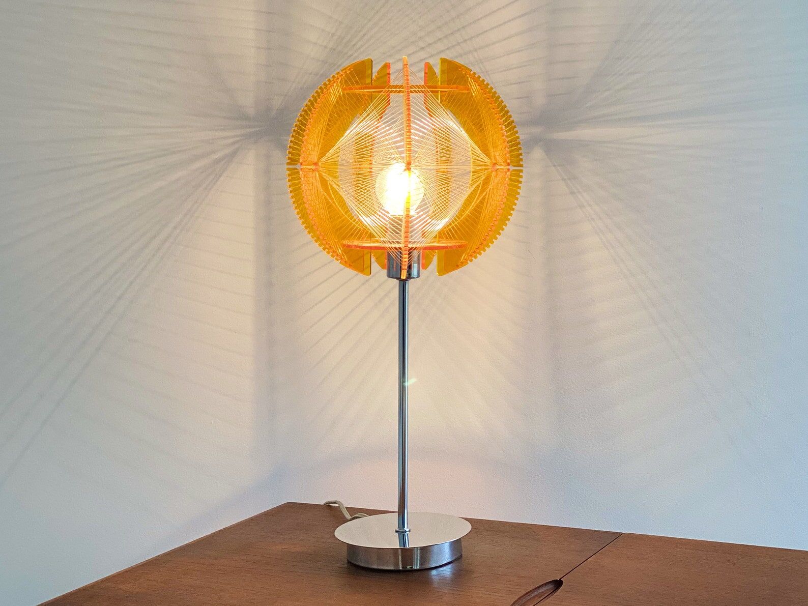Space Age acrylic table lamp with a nylon wire thread & orange acrylic shade
