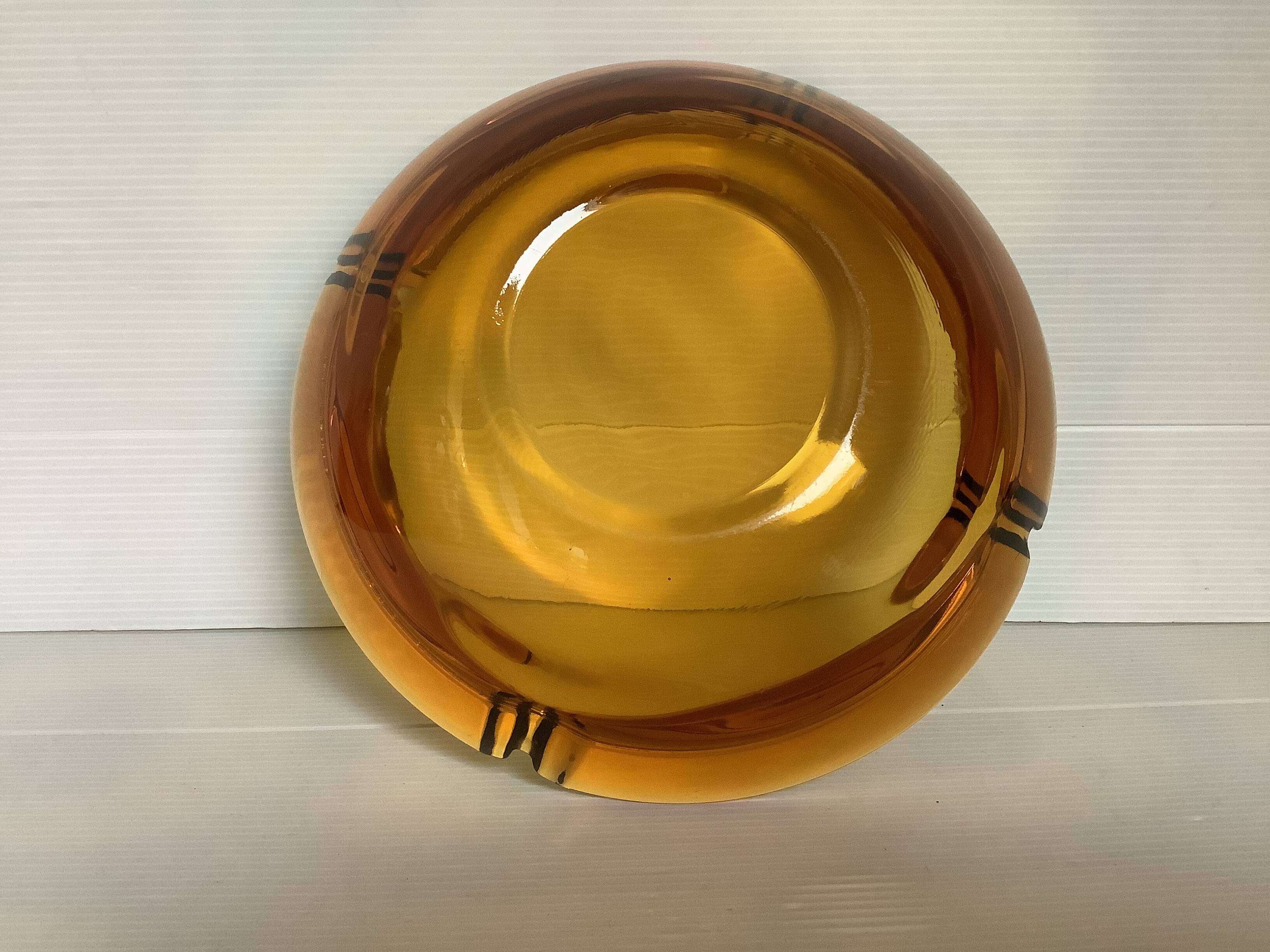 Large empty pocket ashtray thick glass