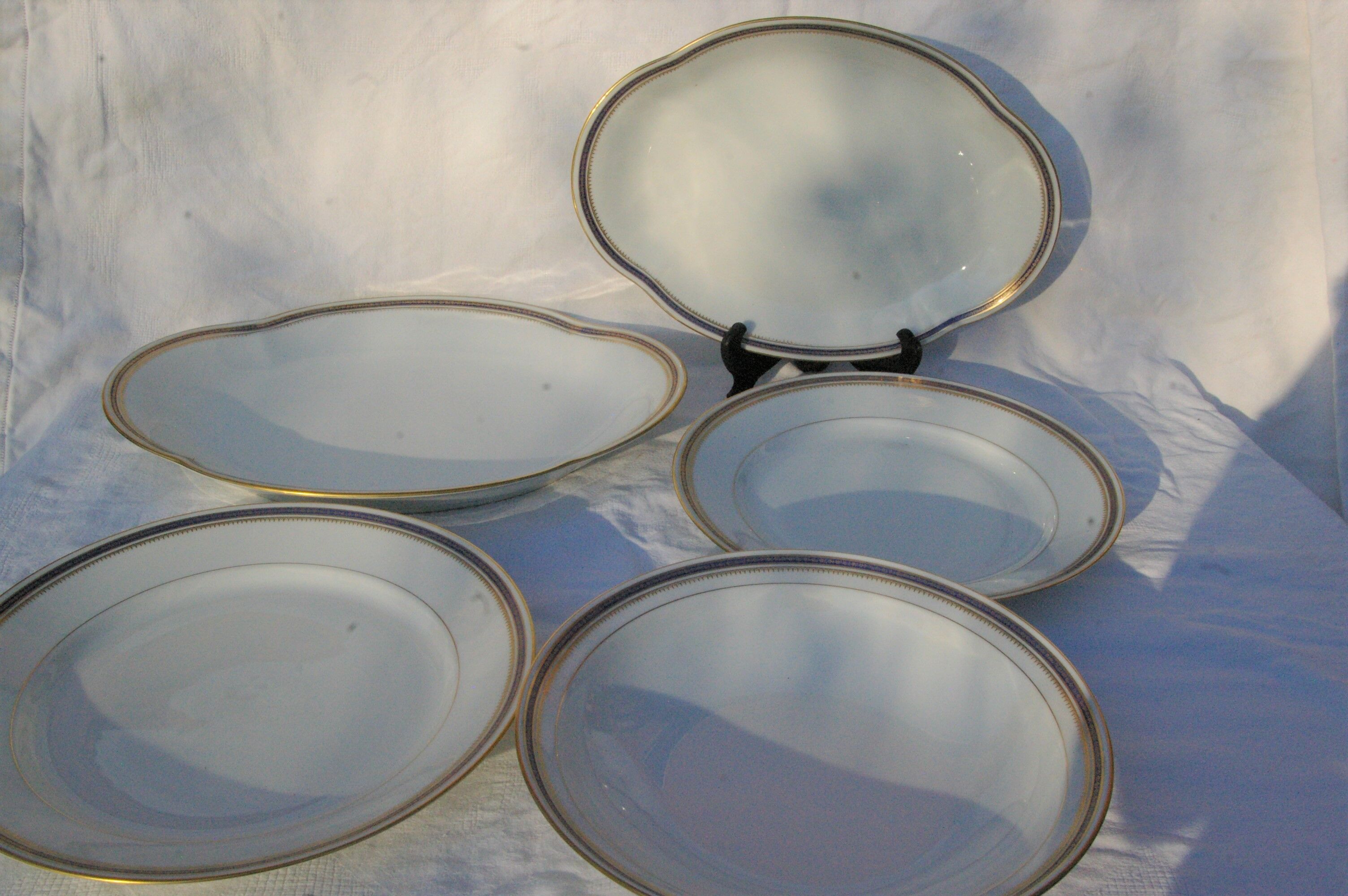 Table service 58 pieces in limoges porcelain uc - blue and gold border