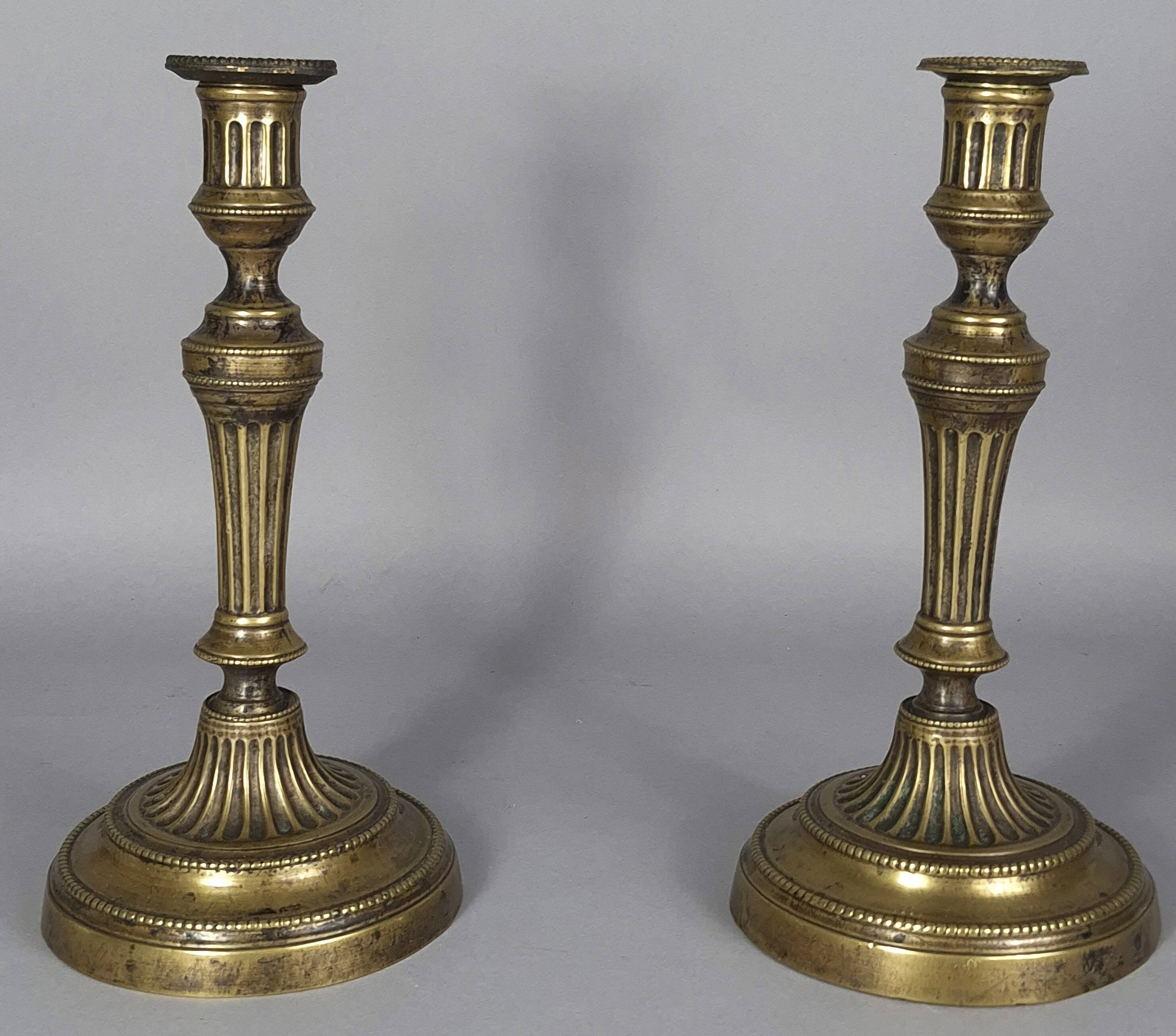 Pair of fluted bronze candlesticks Louis XVI period 27 cm