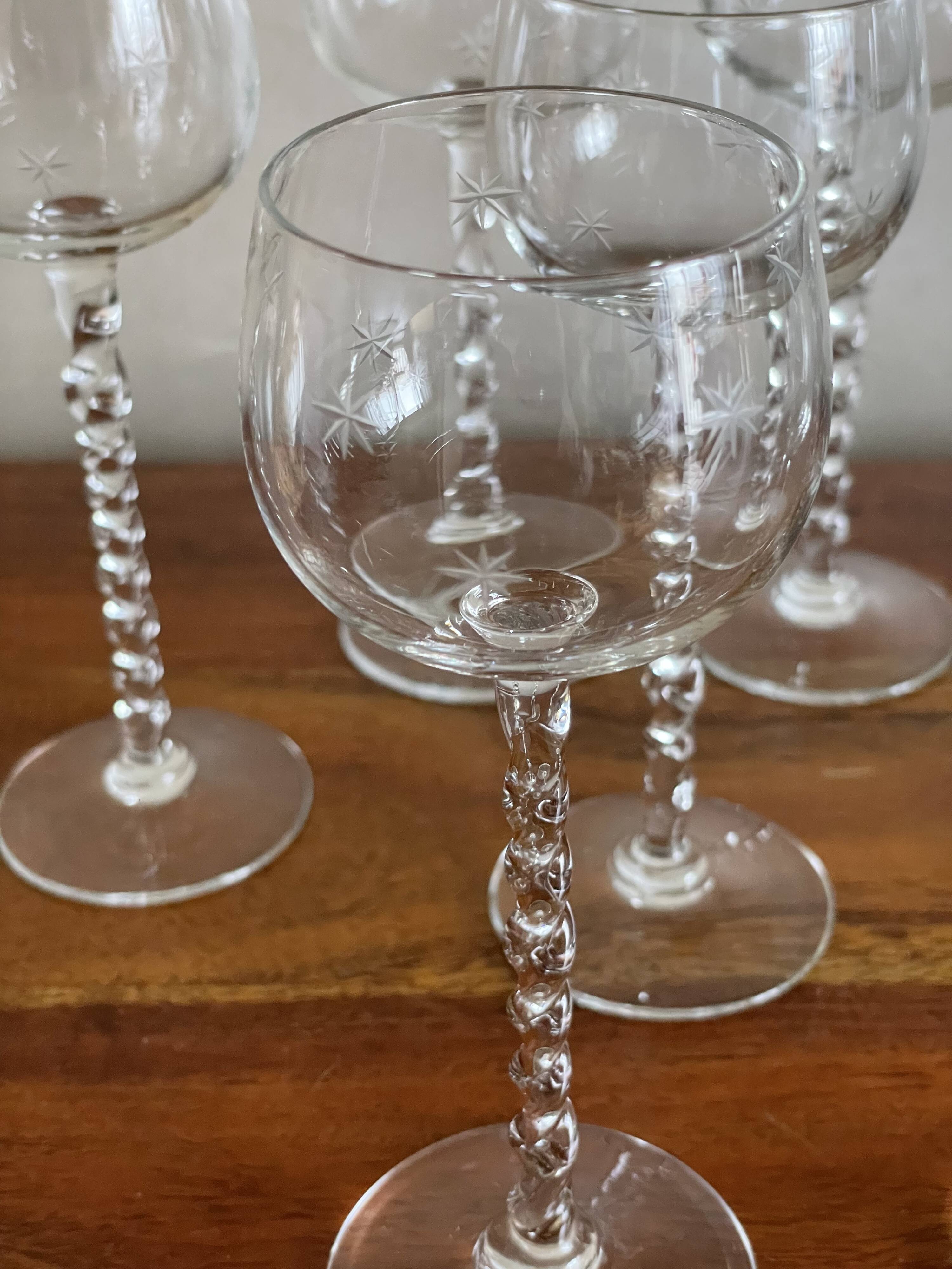8 glasses with twisted stem and star pattern