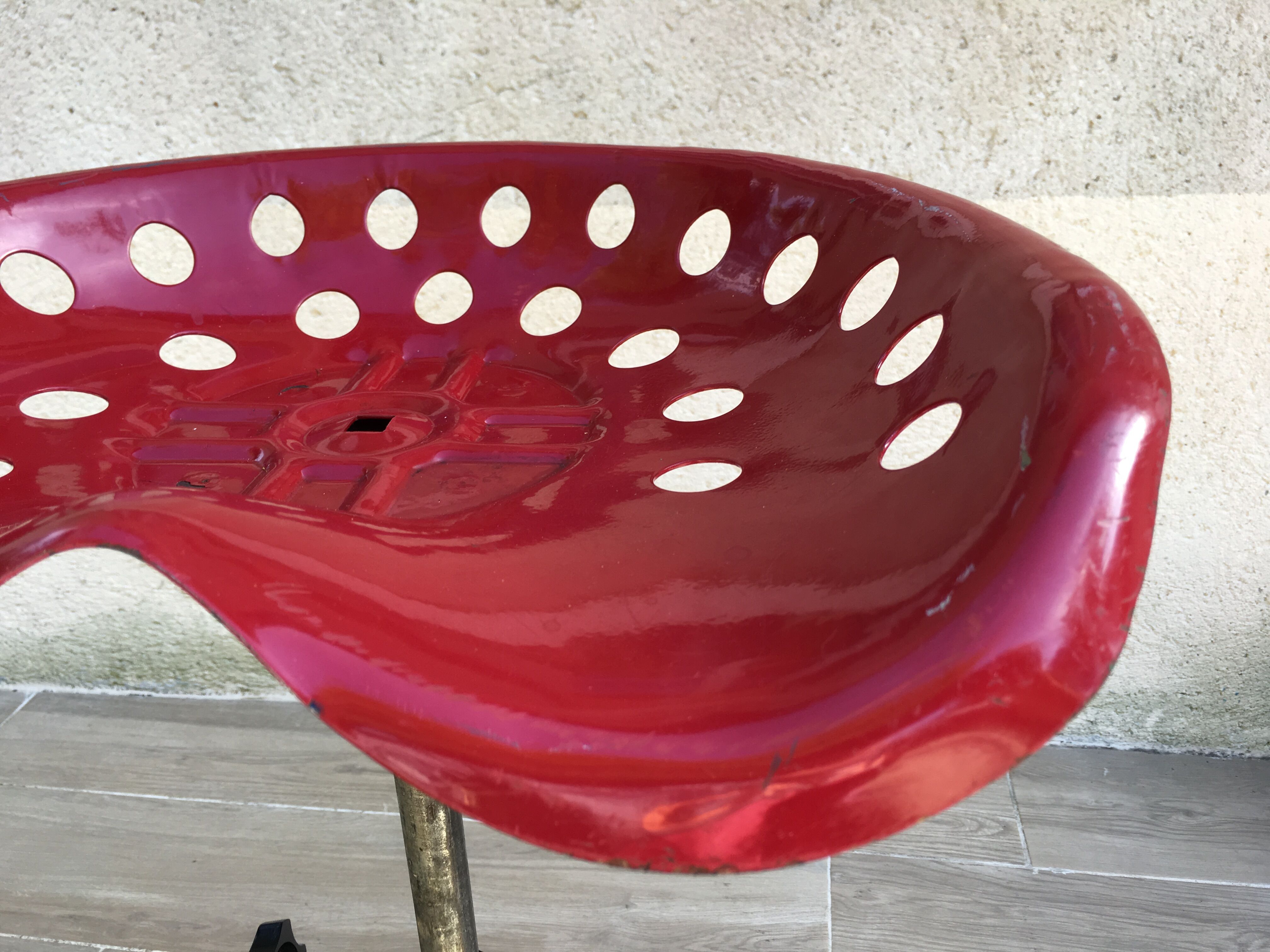 Vintage high stool sitting tractor