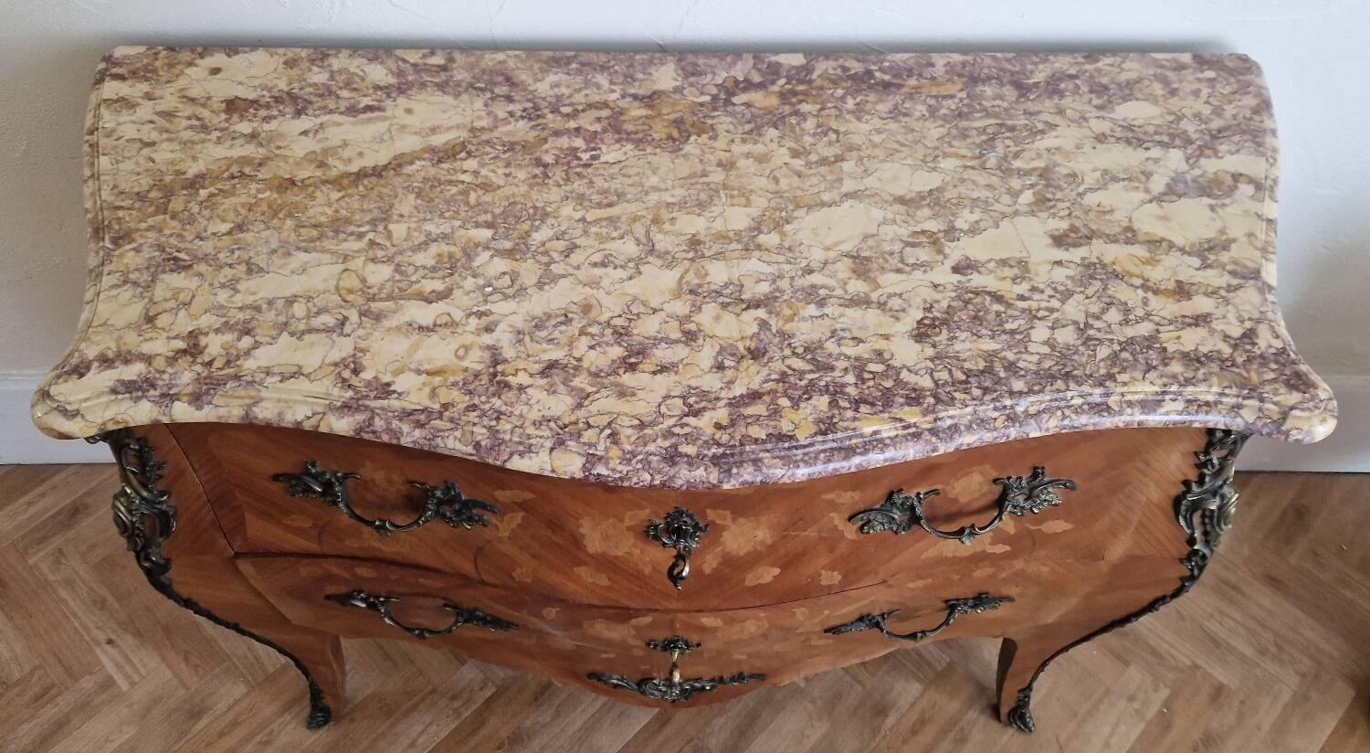 Louis XV style commode, pink and ochre marble.