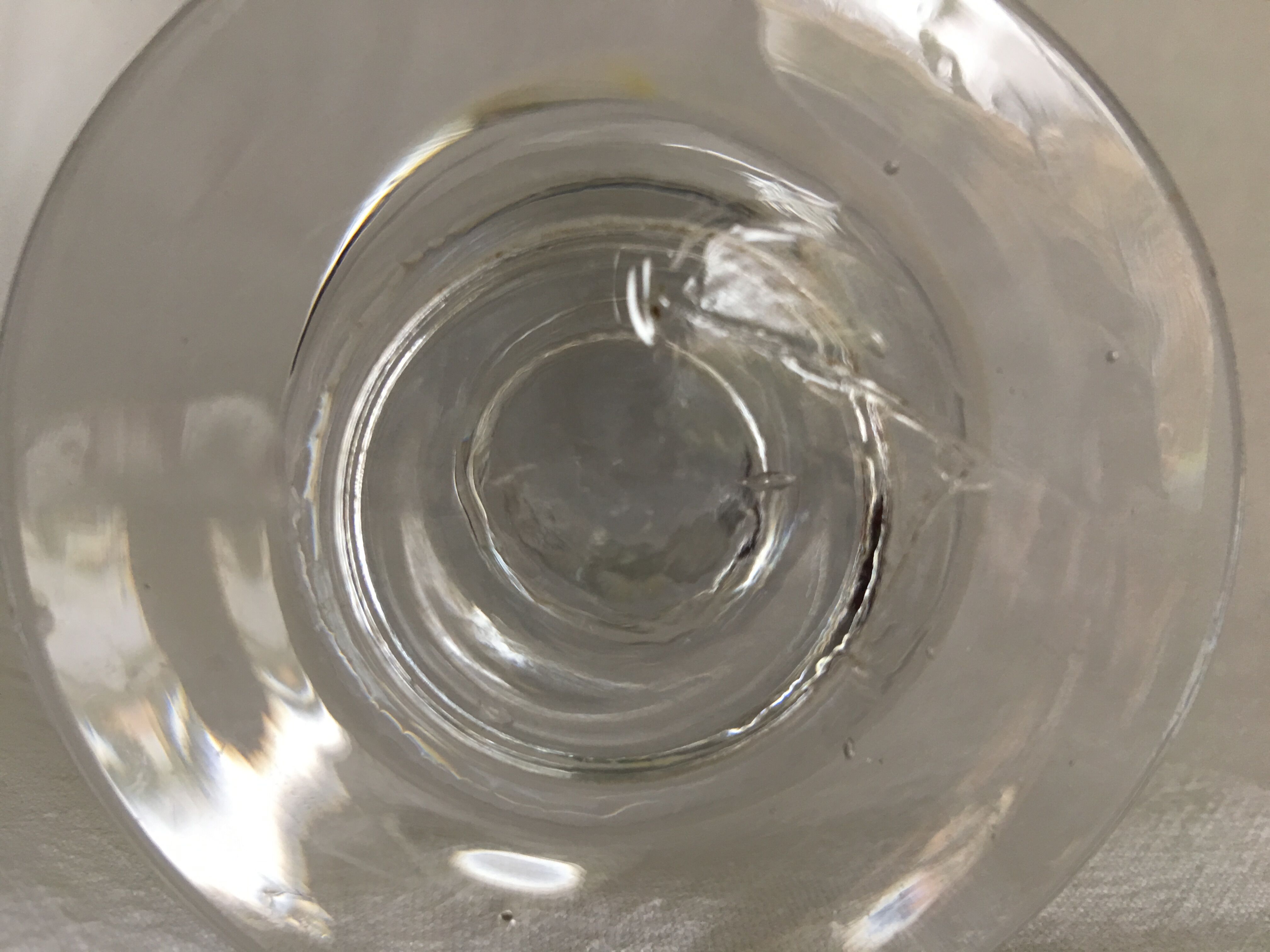 Glass on foot - blown glass bubble late nineteenth early twentieth