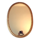 Miroir doré à décor de feuilles d'eau et de palmettes