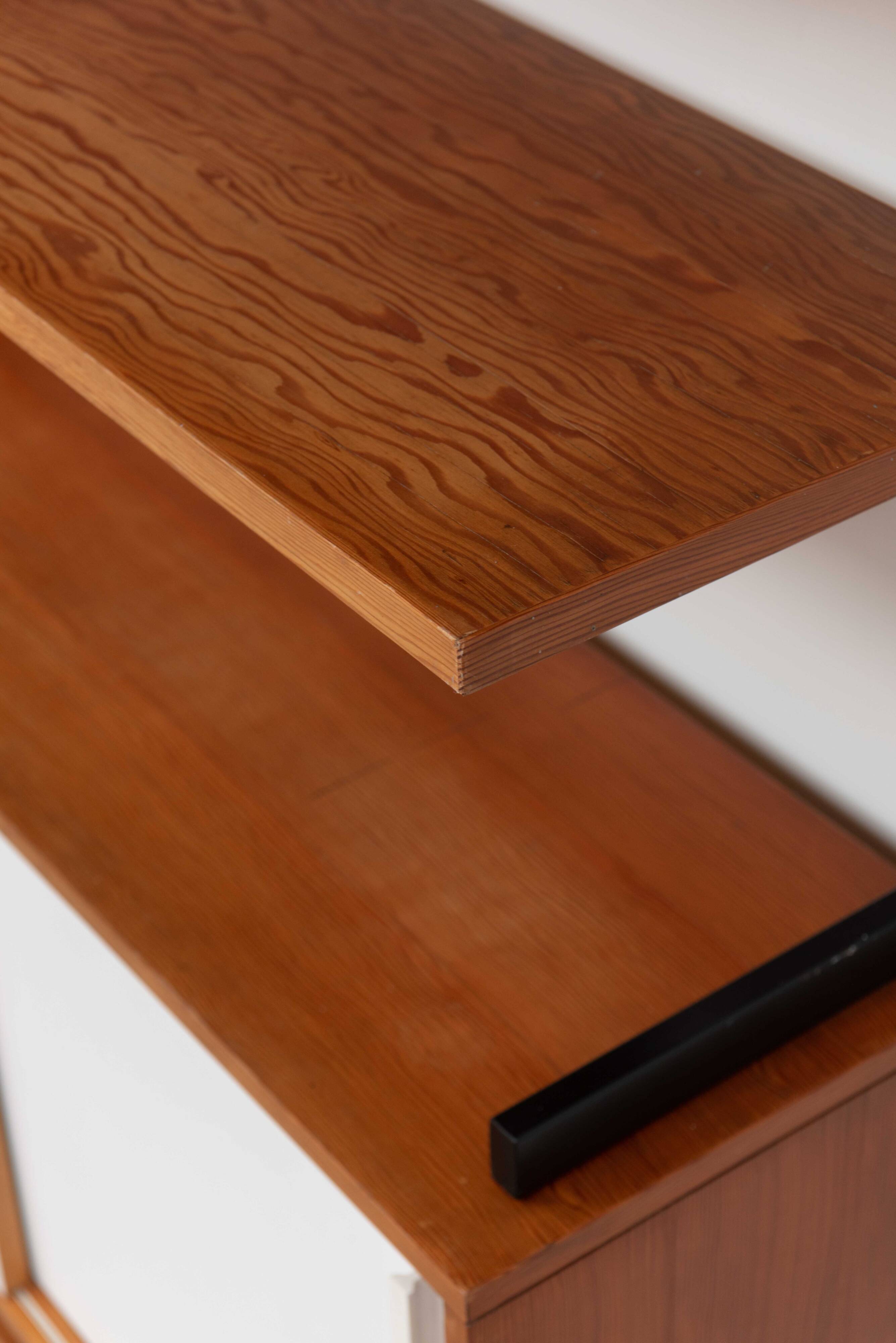 Teak wall shelf designed by Jul de Roover