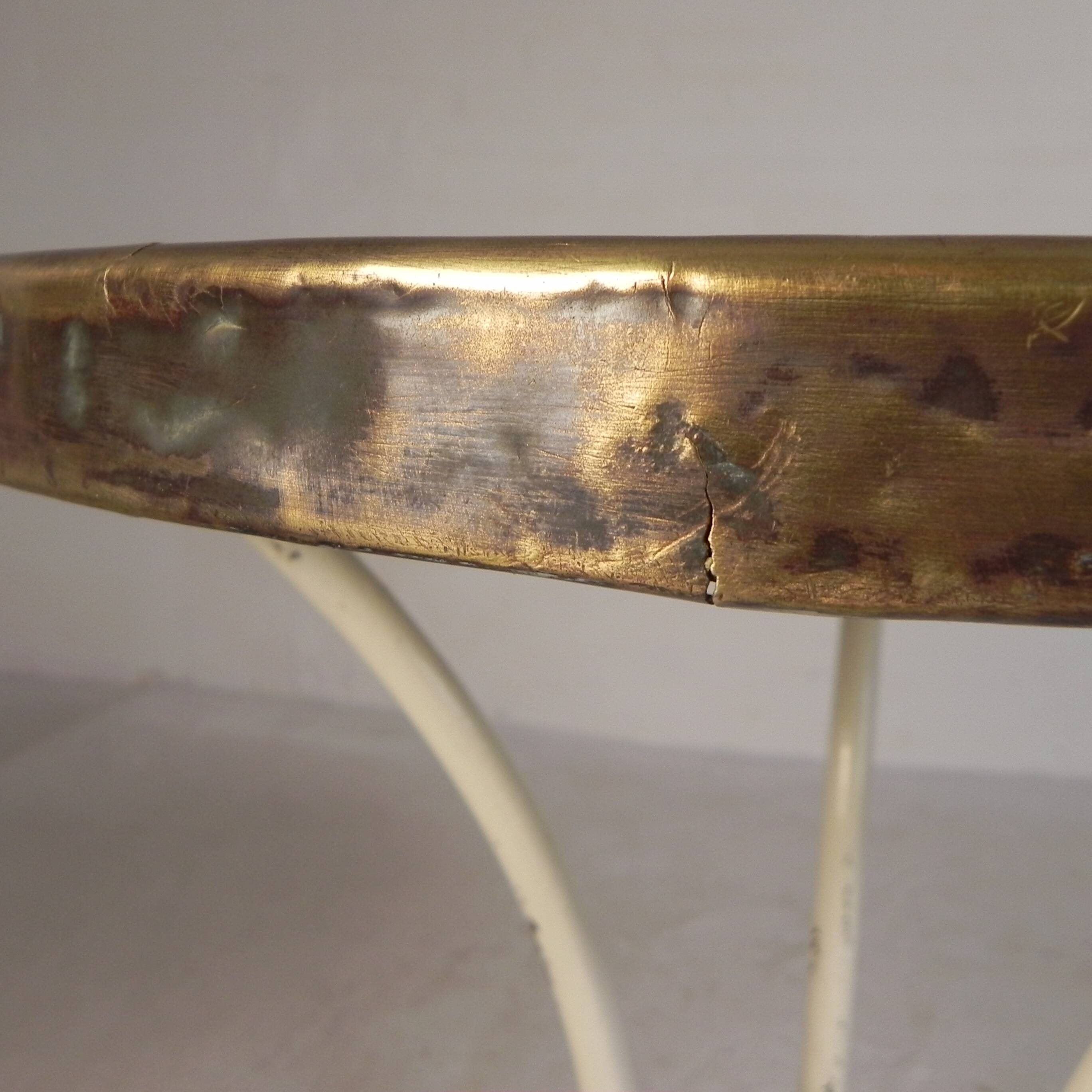 Bistro table with a marble top and brass edging, early 20th century.