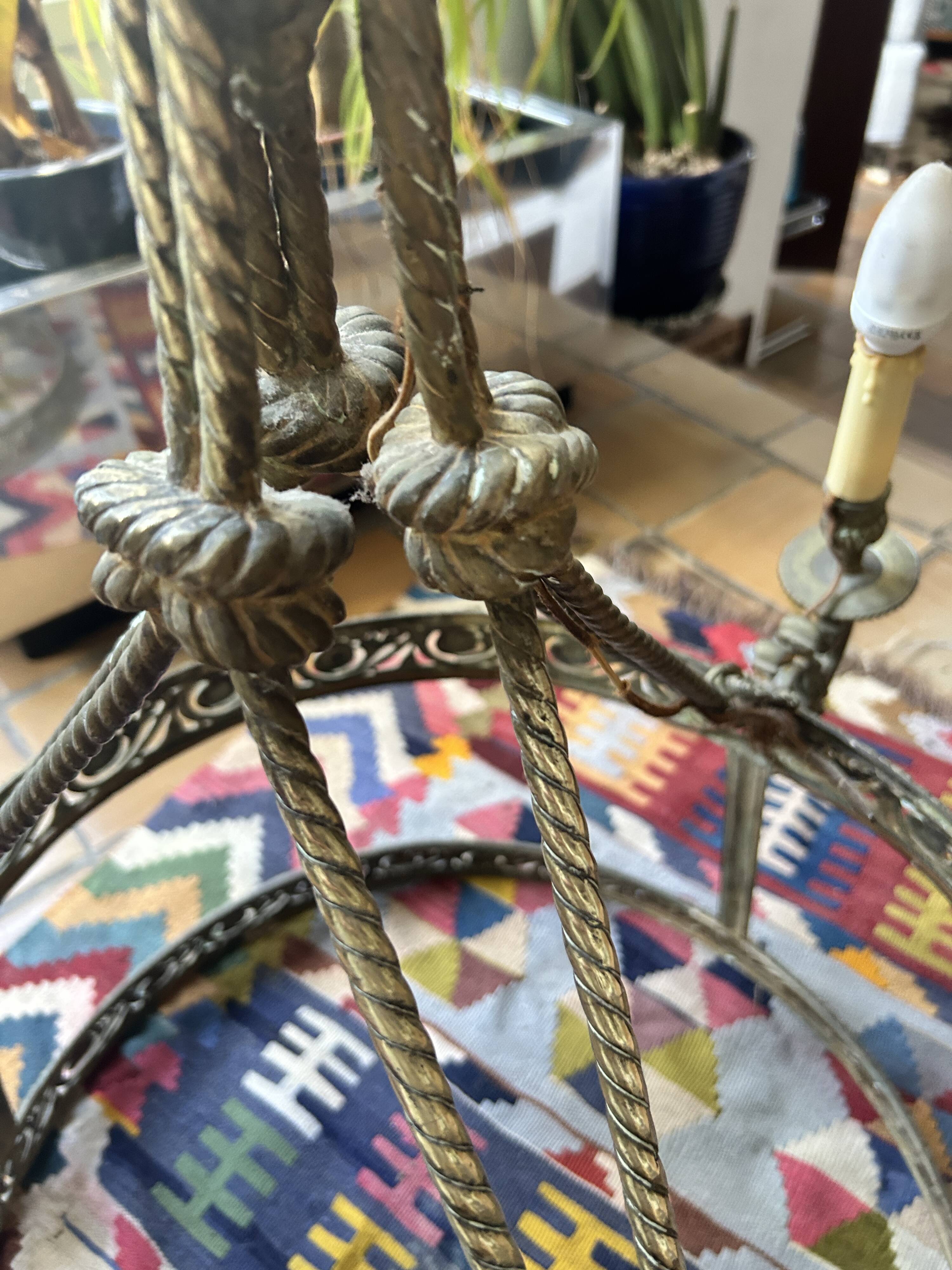 Brass chandelier from the early 20th century.