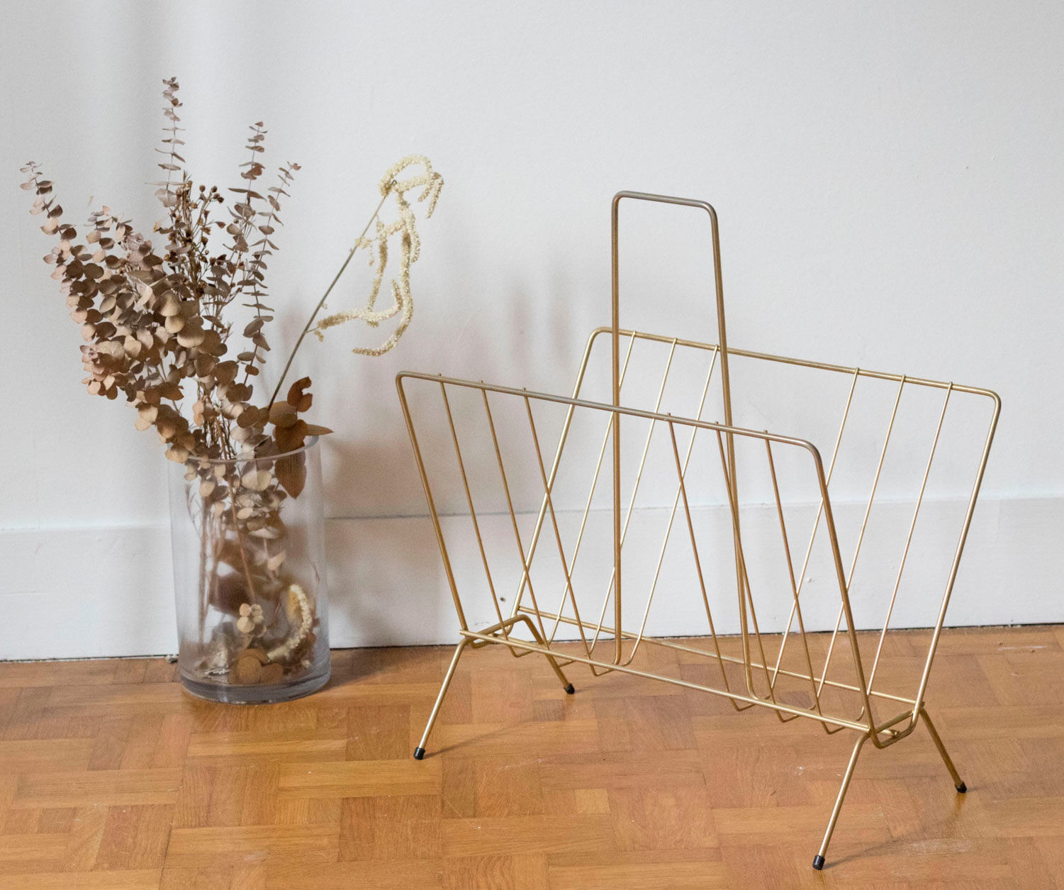 Vintage magazine holder in gold metal