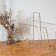 Vintage magazine holder in gold metal