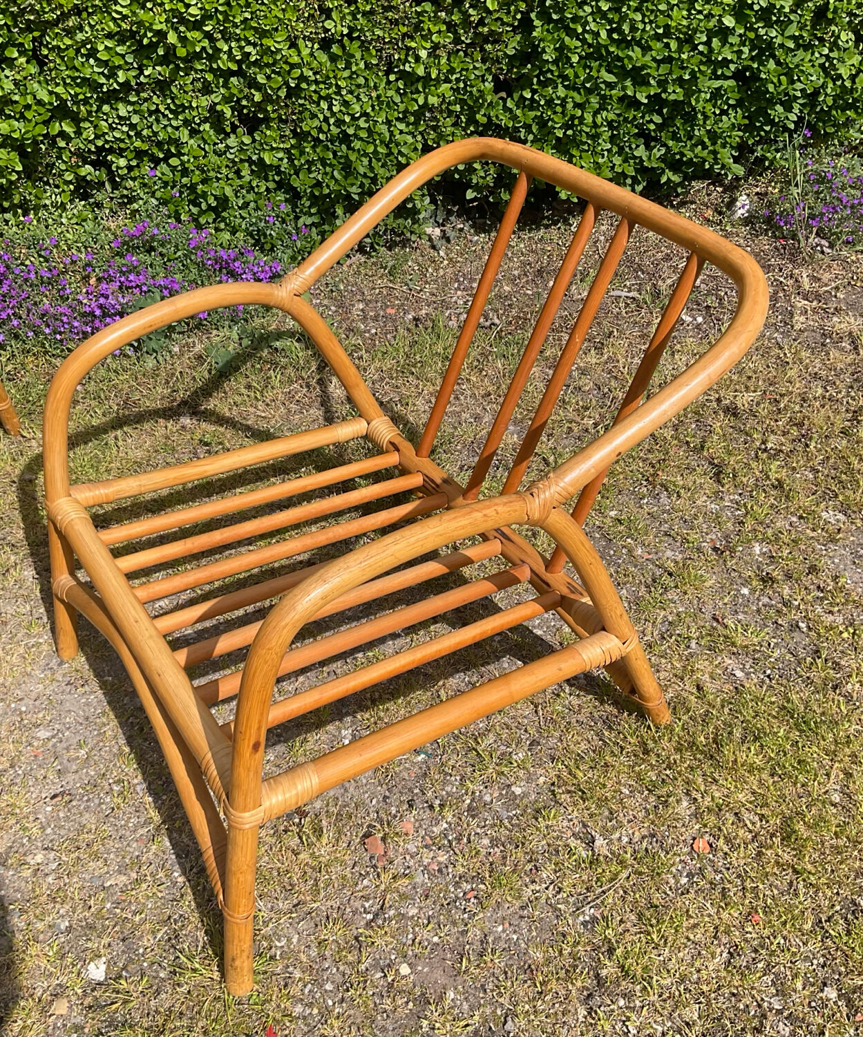 Vintage living room sofa and 2 rattan armchairs.