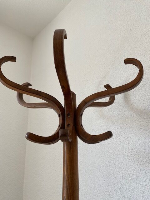 Wooden parrot coat rack