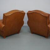 Pair of French club chairs with moustache back in cognac leather, 1950s