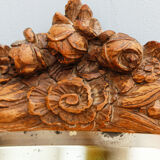 Beveled mirror in carved wood