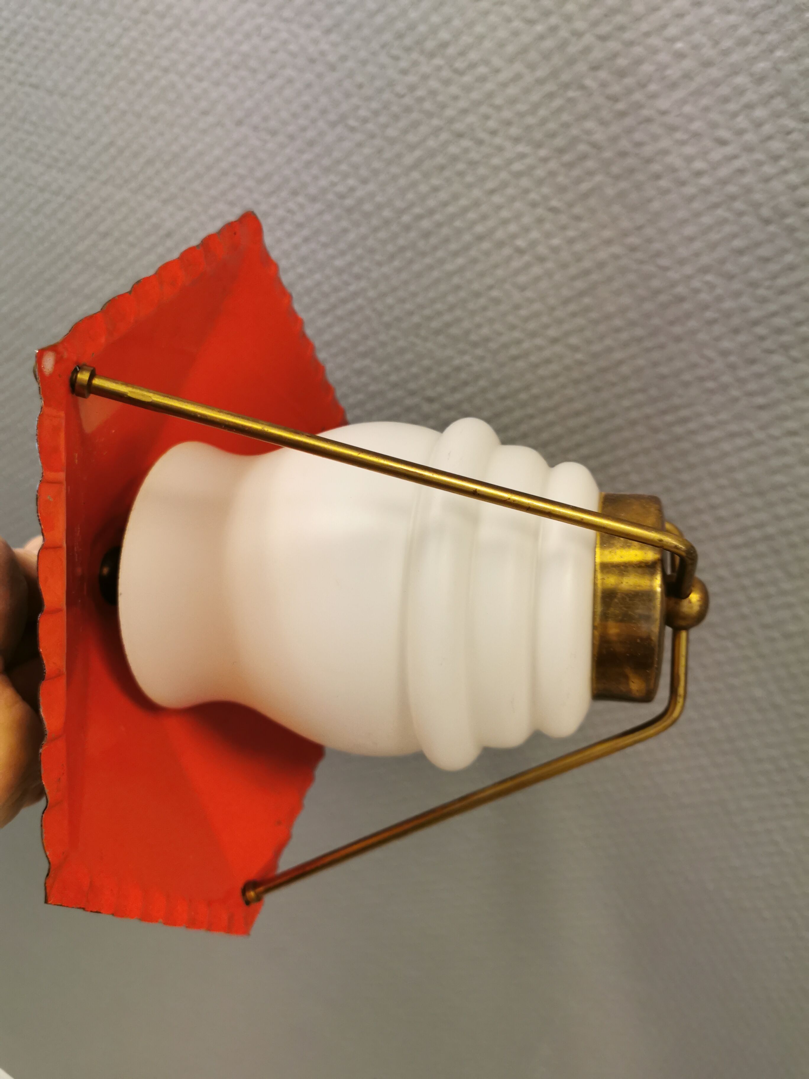 Danish hanging lamp from the 50-60s, made of brass, metal and with milky white glass shade.