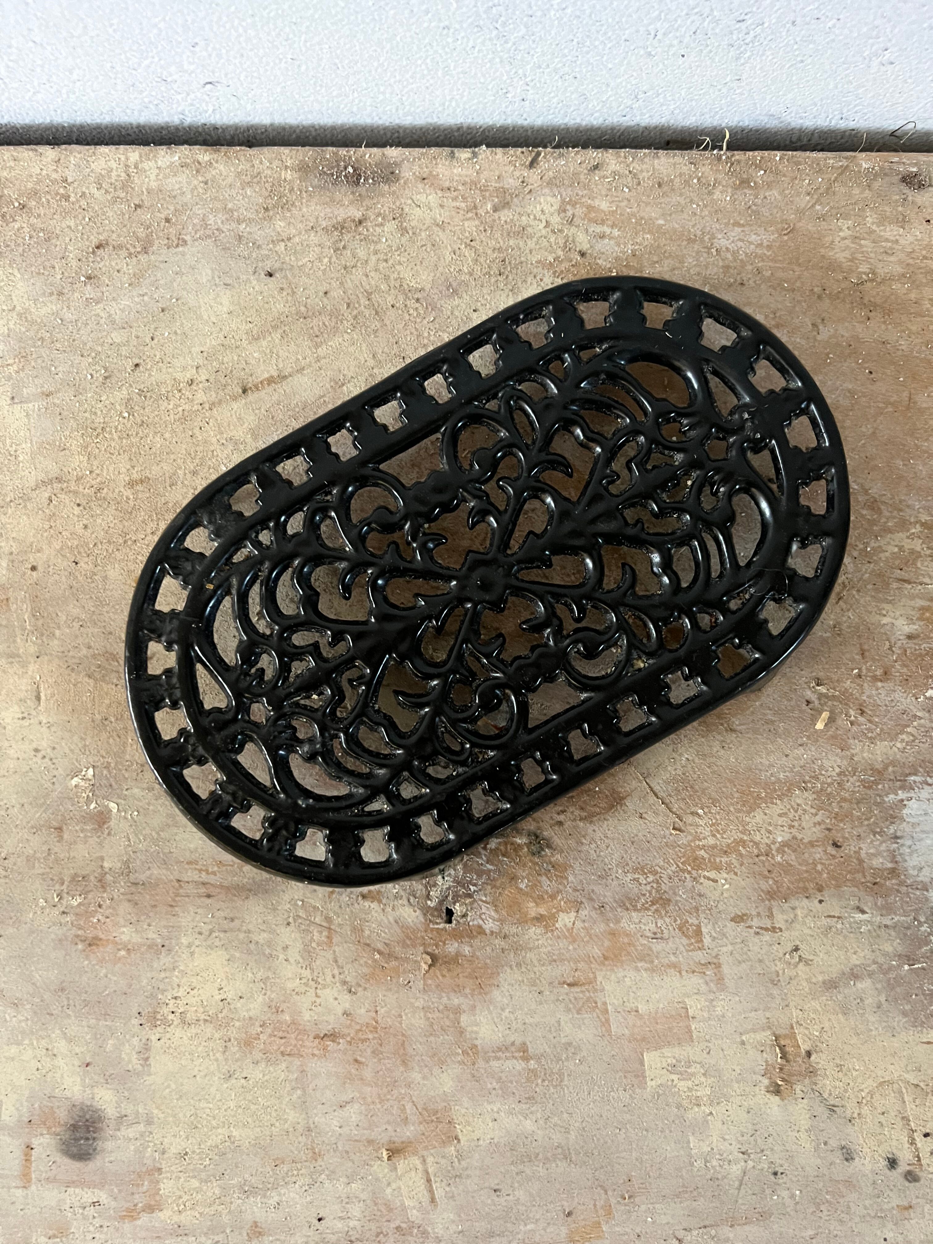 Black cast iron trivets