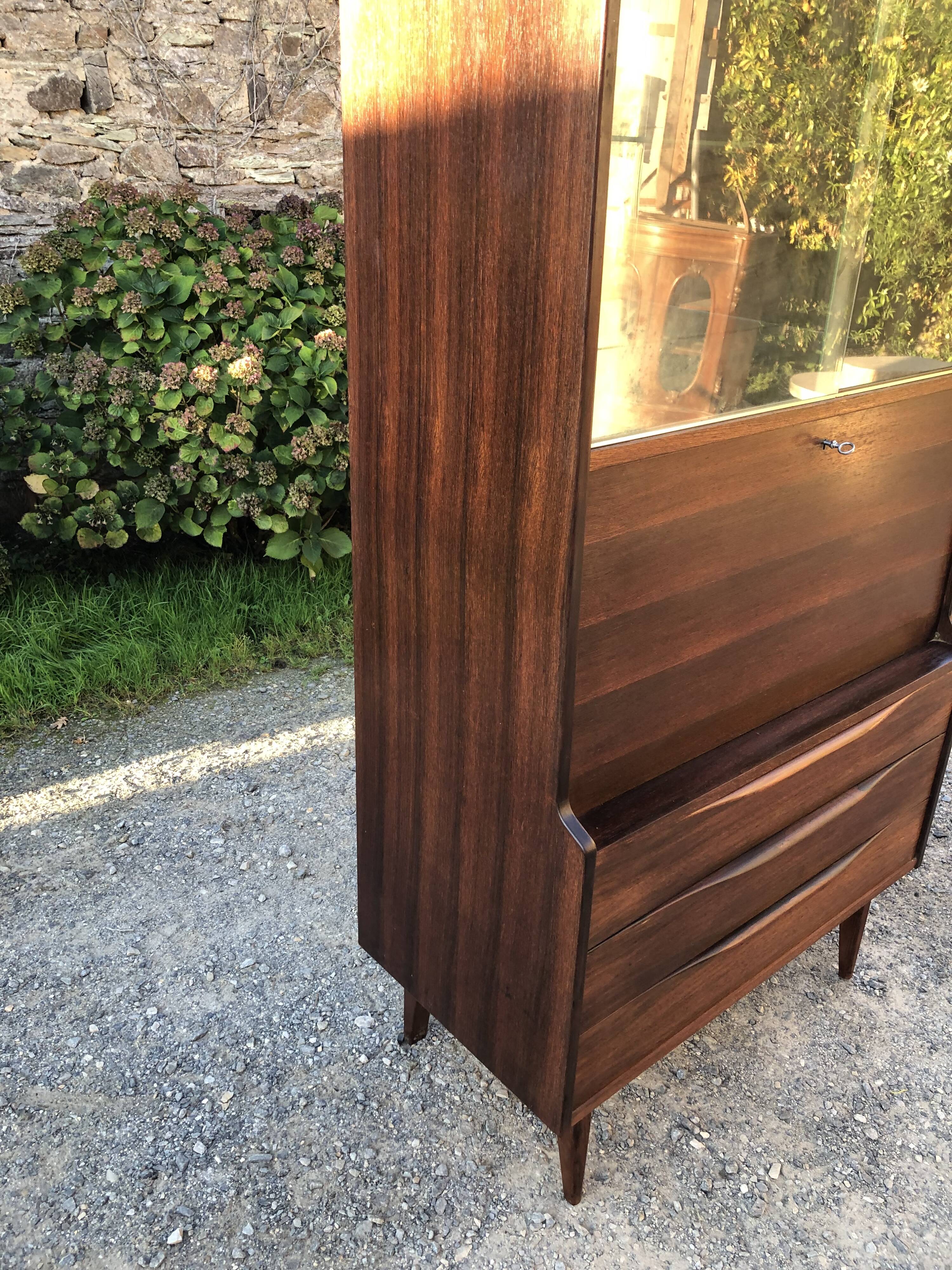 Vintage Scandinavian secretary in rosewood with drawers featuring fin-style handles.