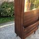 Vintage Scandinavian secretary in rosewood with drawers featuring fin-style handles.
