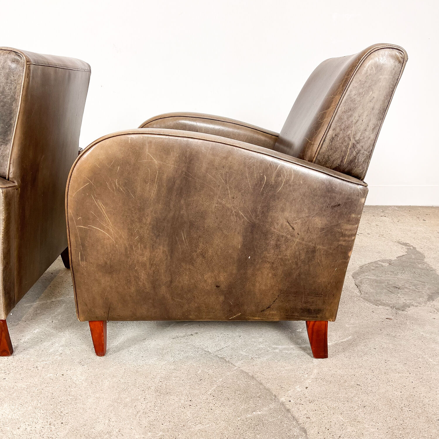 Set of two vintage leather wagon wheel armchairs Haarle