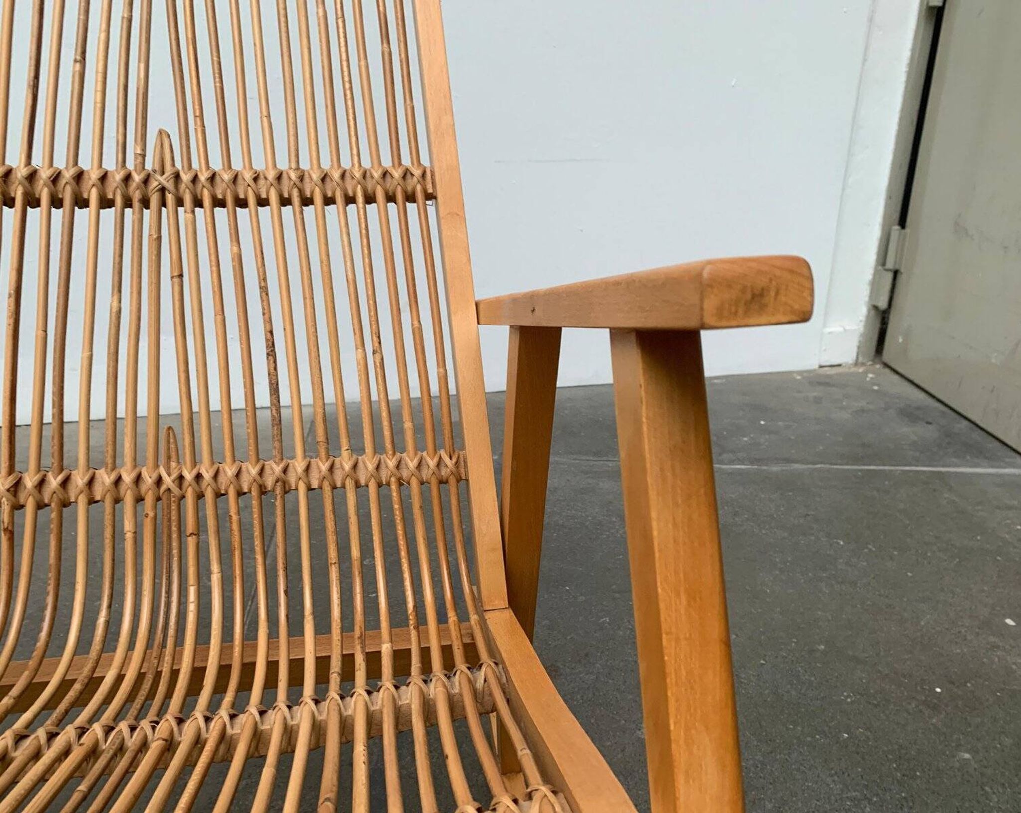 Mid-century German rattan rocking chair from Deutschen Werkstätten Hellerau, 1960s.