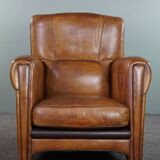 Striking modern design armchair made of high-quality sheepskin leather