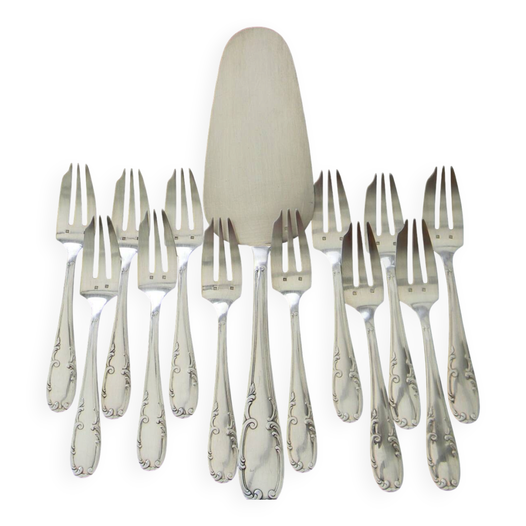 12 cake forks and a silver metal server.