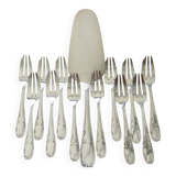 12 cake forks and a silver metal server.