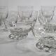 Set of Art Deco style engraved crystal bowls and glasses on spherical feet