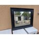 Black lacquered wood mirror "originally punctured"