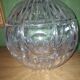 Vase boule en cristal taillé (
