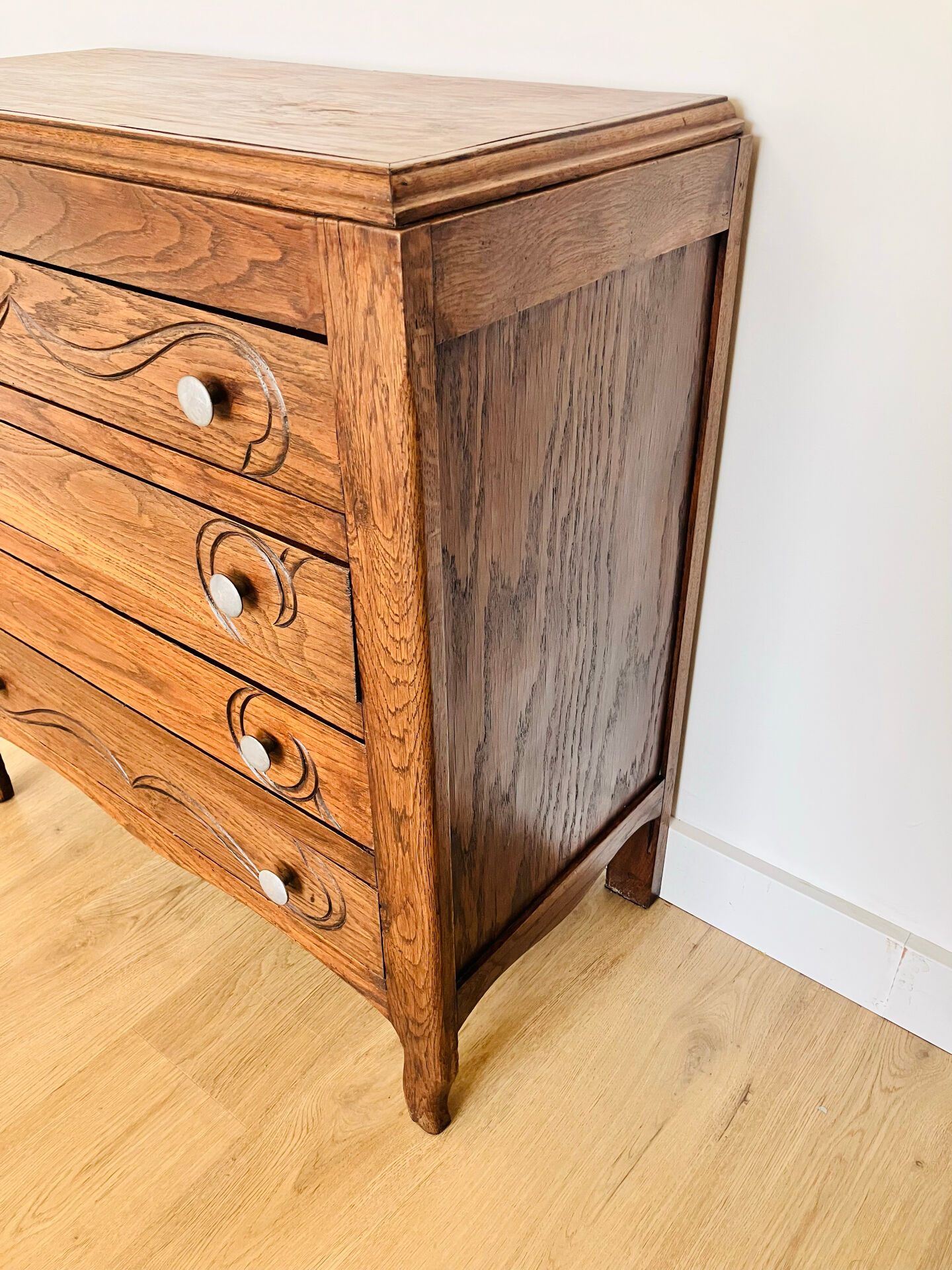 Antique commode with carved relief