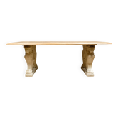 Importante table rectangulaire en pierre de teinte crème et bois clair