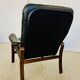 Vintage mid-century Scandinavian black leather lounge chair 1970s