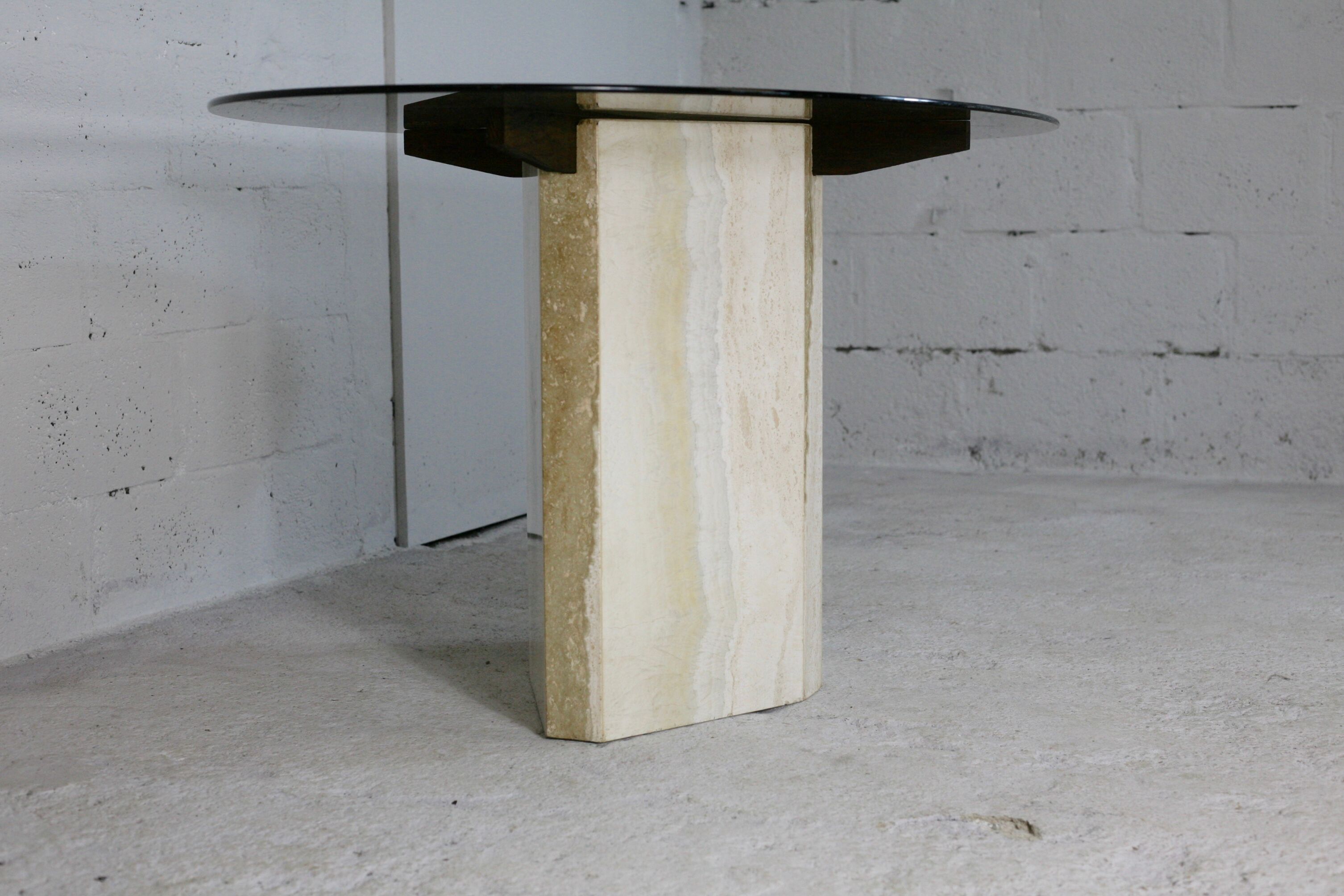 Living table, Comblanchian stone base and elliptical tray in smoked glass, Italy, 1970