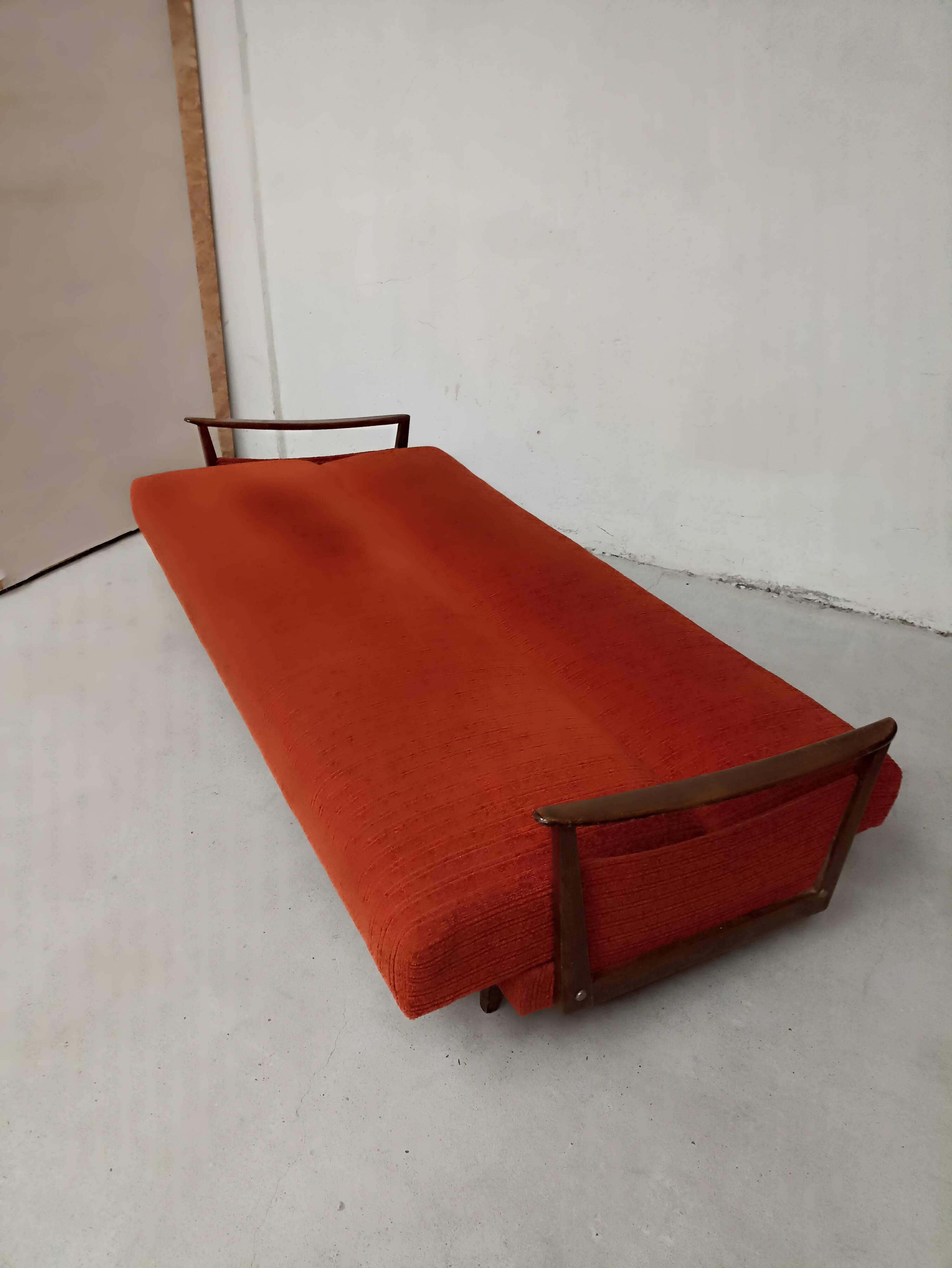 Vintage orange convertible sofa