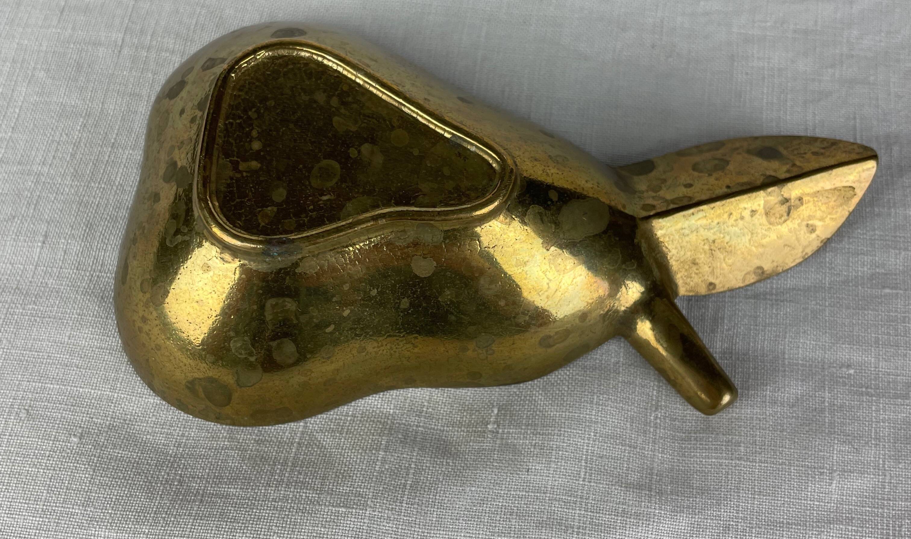 Empty pocket ashtray in pear-shaped brass