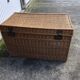 Old braided wicker trunk