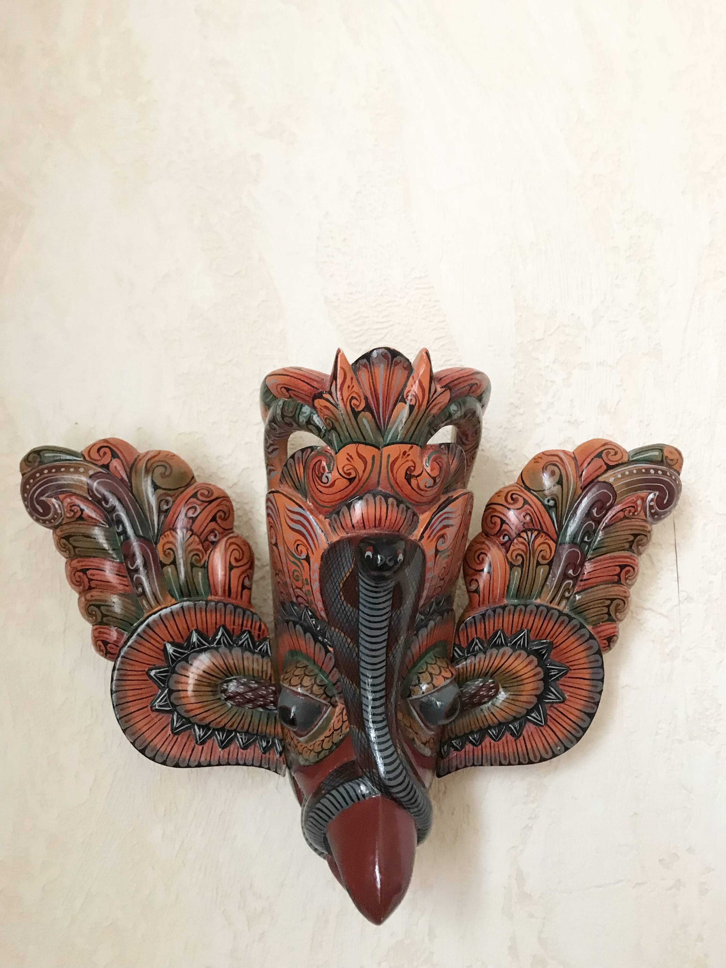 Wooden triptych mask