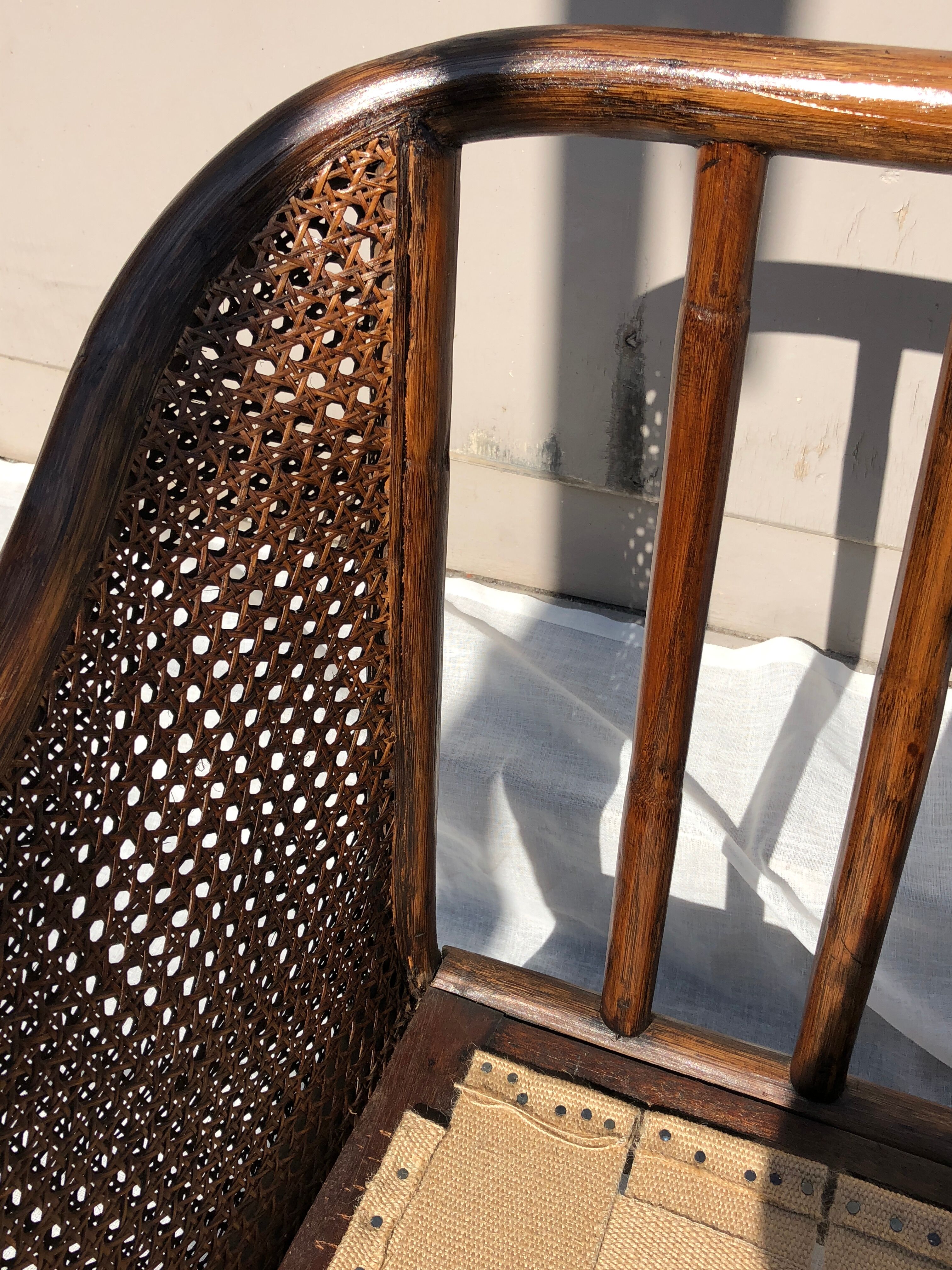 Rattan armchair and cane kok