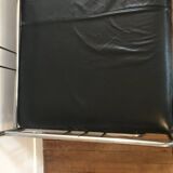 Sofa and armchair in chrome metal and black leather