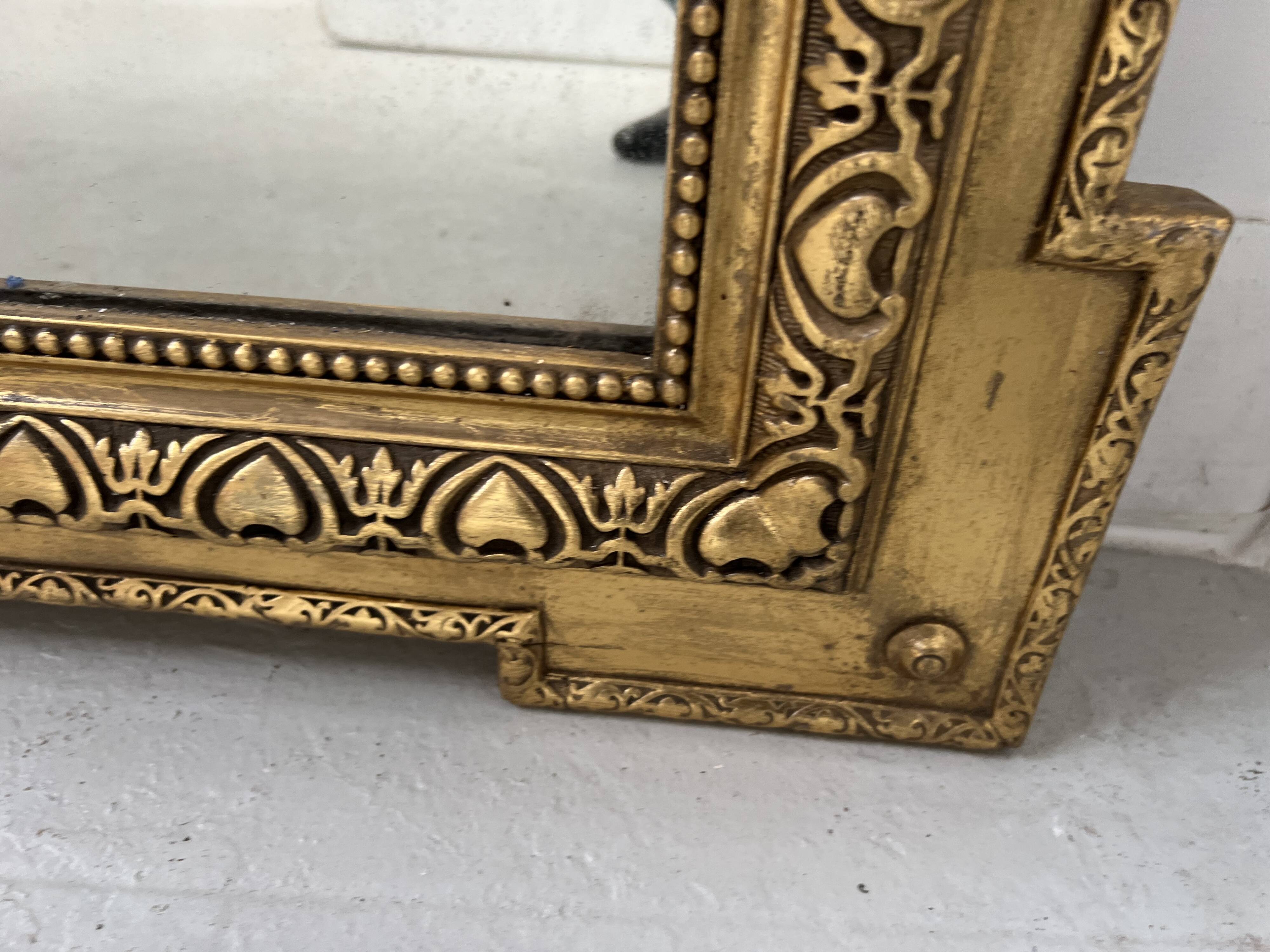 Louis XVI style mirror in wood and gilded stucco, 19th century