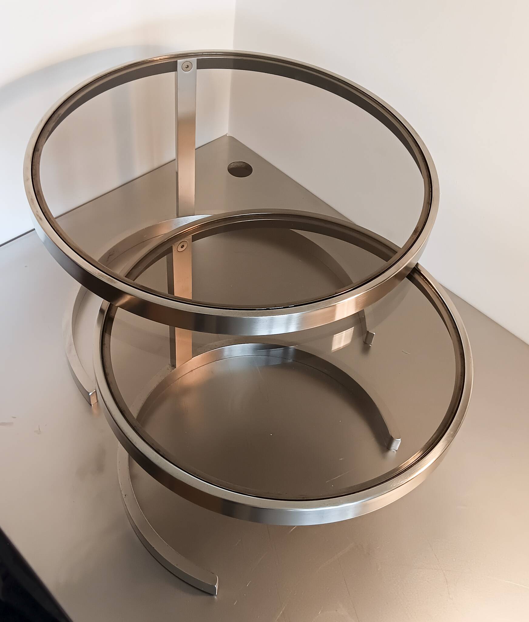 2 vintage 1970s smoked glass and brushed metal nesting coffee tables