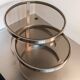 2 vintage 1970s smoked glass and brushed metal nesting coffee tables