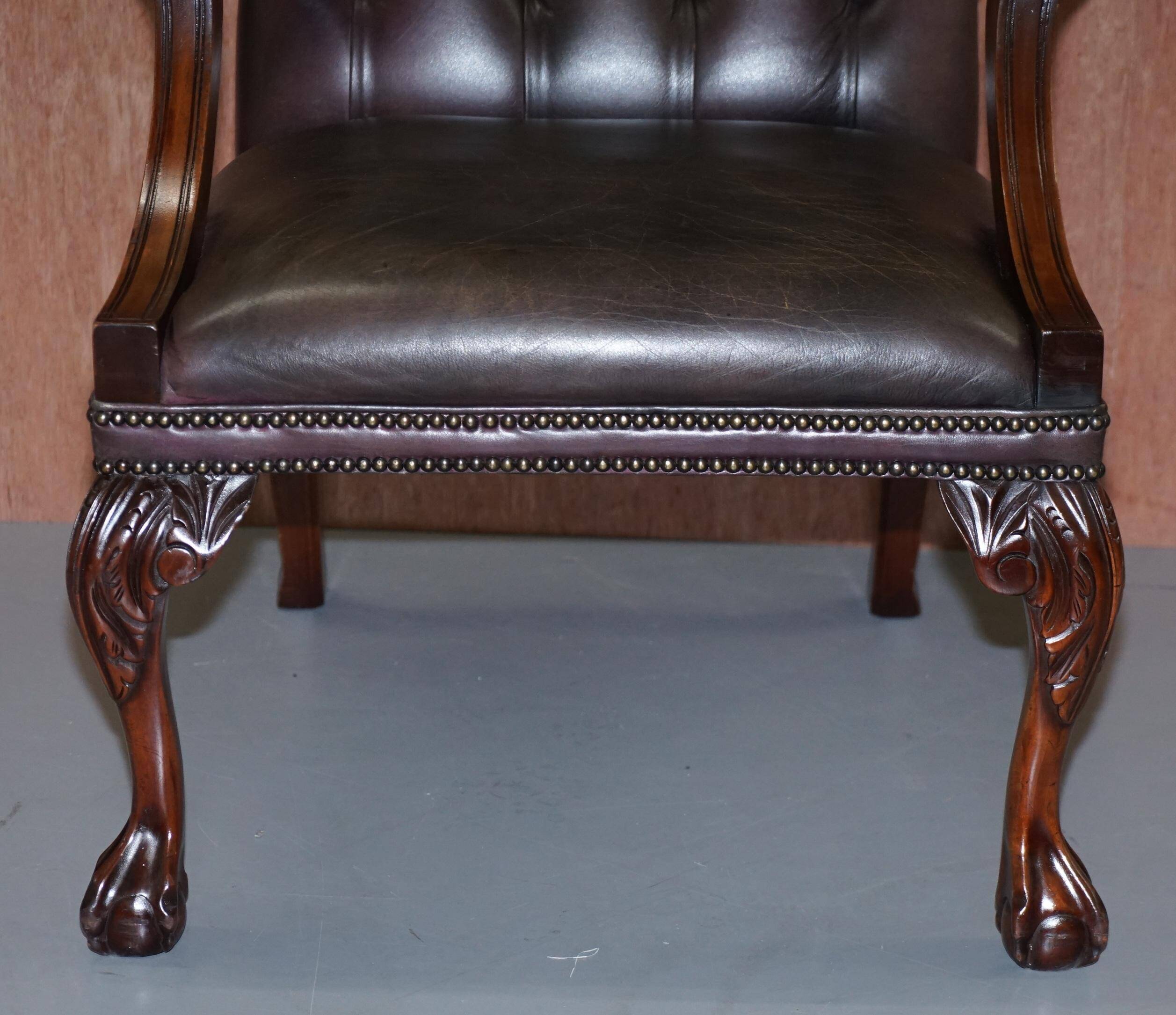 Gainsborough armchair George II leather Chesterfield hand-carved with claw and ball feet.