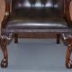 Gainsborough armchair George II leather Chesterfield hand-carved with claw and ball feet.
