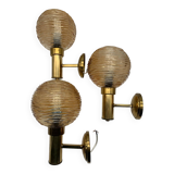 Set of 3 globe wall lights in glass and gold metal