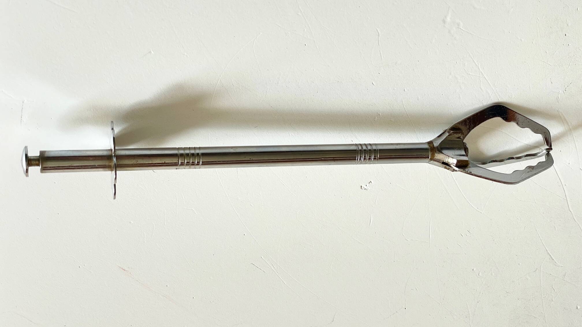Long vintage chrome metal sugar tongs