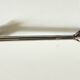 Long vintage chrome metal sugar tongs
