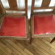 2 chaises vintage en bois et simili cuir rouge